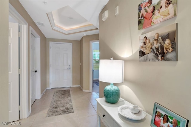 foyer with light tile patterned flooring