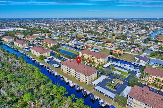 bird's eye view with a water view