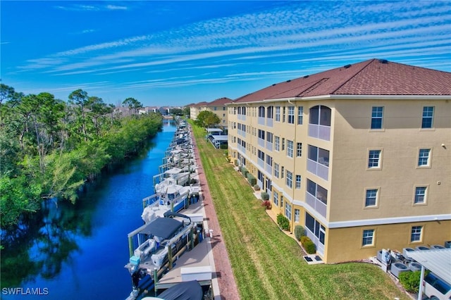 drone / aerial view with a water view