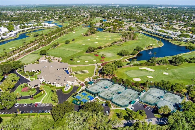 bird's eye view featuring view of golf course, a water view, and a residential view