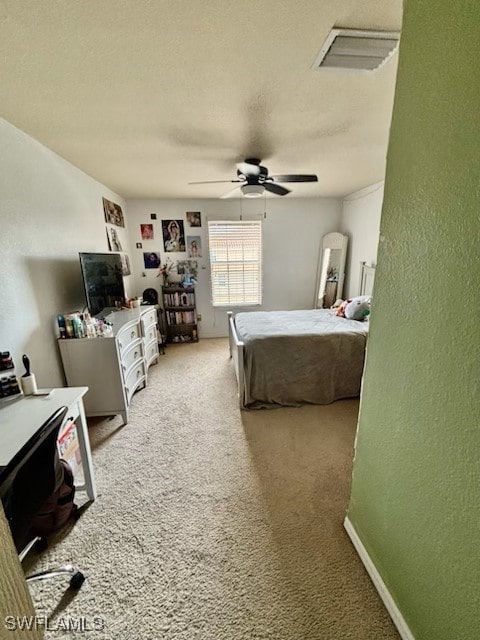 bedroom featuring carpet flooring and ceiling fan