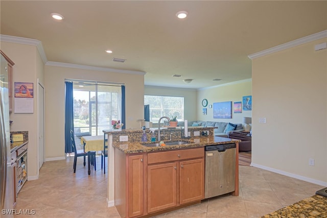 kitchen featuring sink, a kitchen island with sink, light stone counters, ornamental molding, and stainless steel dishwasher