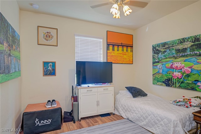 bedroom featuring ceiling fan and light hardwood / wood-style floors