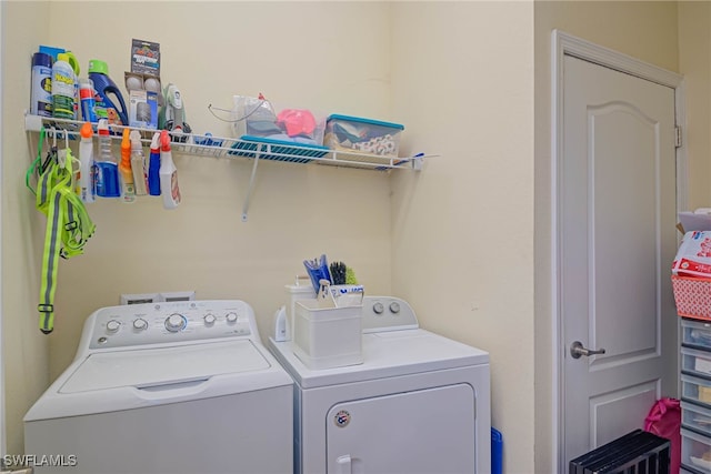 laundry area with washer and dryer