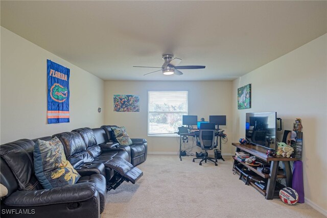 carpeted home office with ceiling fan