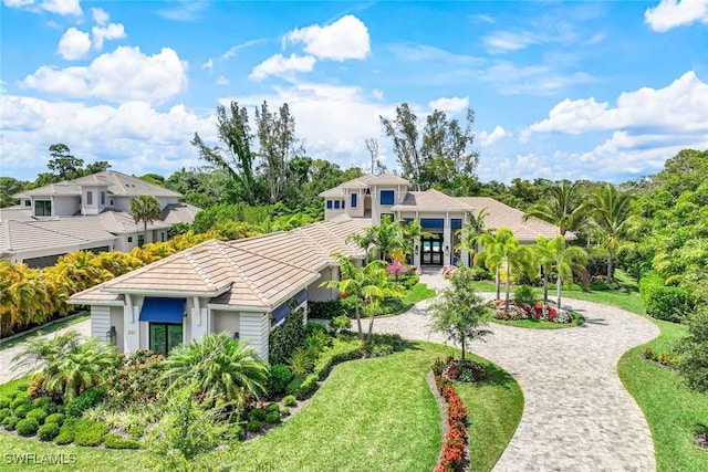 view of front of property with a front lawn