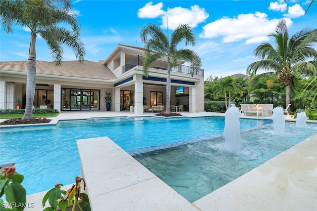 view of swimming pool featuring a patio