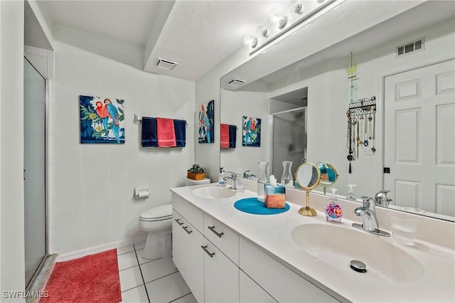 full bathroom featuring a stall shower, tile patterned flooring, visible vents, and a sink