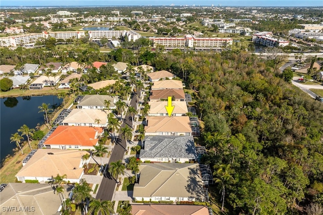 bird's eye view with a water view