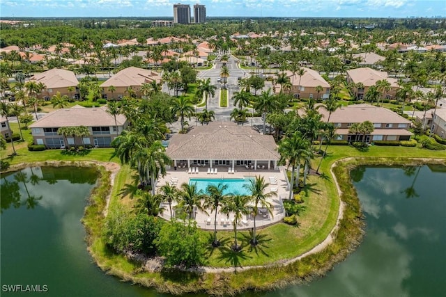 bird's eye view featuring a water view and a residential view