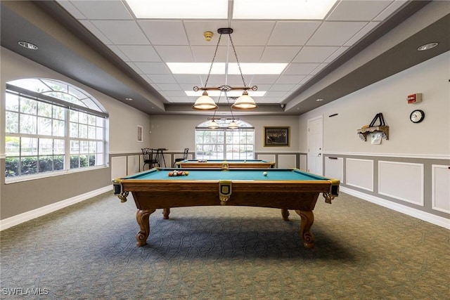 recreation room featuring billiards, a healthy amount of sunlight, carpet flooring, and a tray ceiling