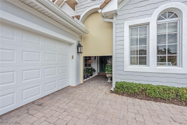 entrance to property with a garage