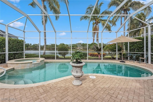 view of swimming pool with an in ground hot tub, a lanai, and a patio