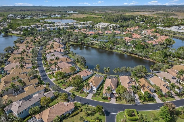 8469 Mallards Way, Naples, FL 34114 - aerial view of property and surrounding area with nearby suburban area and a large body of water