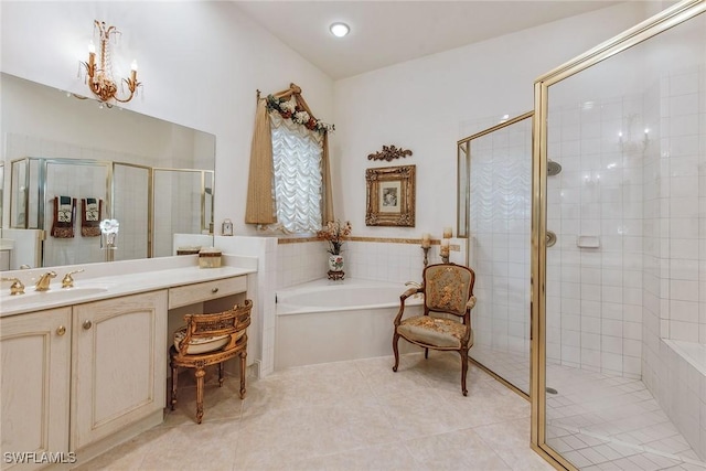 8469 Mallards Way, Naples, FL 34114 - full bath featuring vanity, a shower stall, a garden tub, tile patterned flooring, and a chandelier