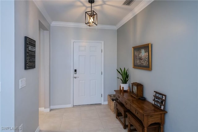 tiled foyer with ornamental molding