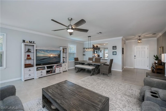 tiled living room with crown molding and ceiling fan