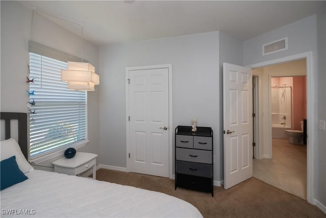 bedroom featuring carpet