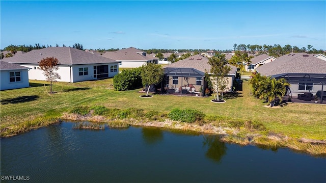 drone / aerial view with a water view