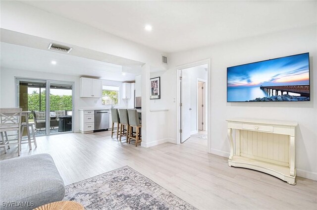 living room featuring light wood-type flooring