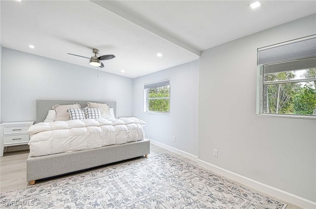 bedroom featuring ceiling fan and light wood-type flooring