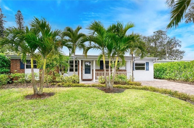 single story home with a front yard