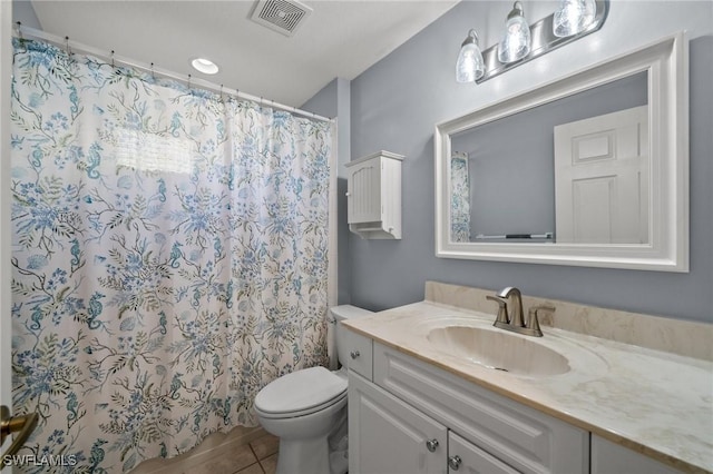 full bath featuring toilet, tile patterned floors, vanity, visible vents, and a shower with curtain