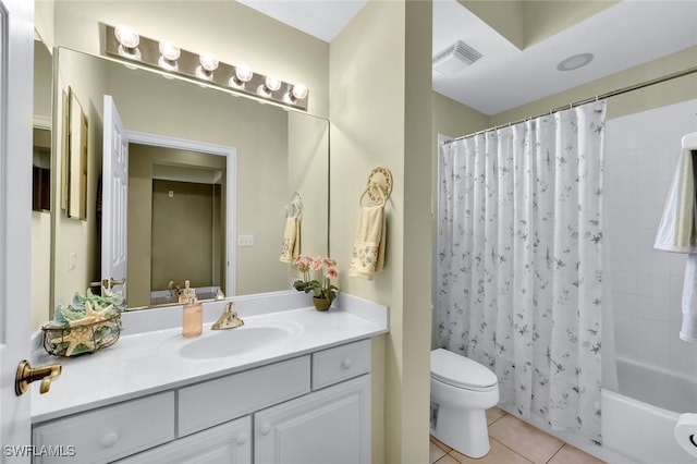 full bathroom with tile patterned flooring, vanity, shower / bath combo, and toilet