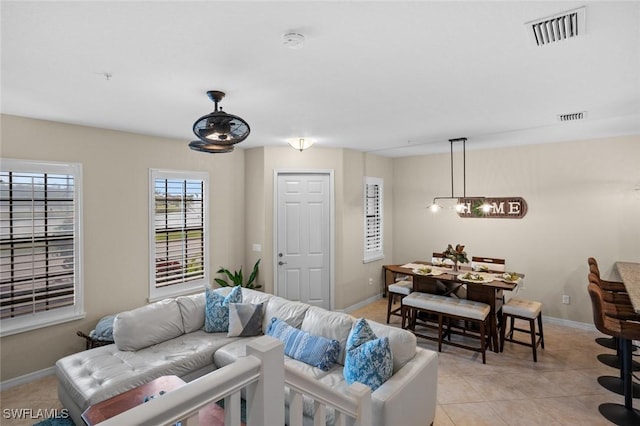 living room with light tile patterned floors