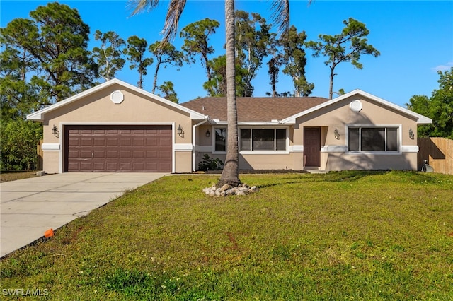 ranch-style house with a garage and a front yard