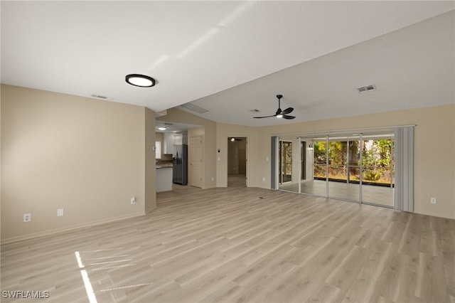 unfurnished living room with light hardwood / wood-style floors and ceiling fan