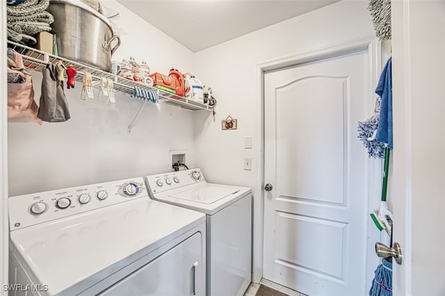 washroom with washer and clothes dryer