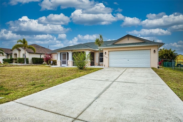 ranch-style house with a garage and a front lawn