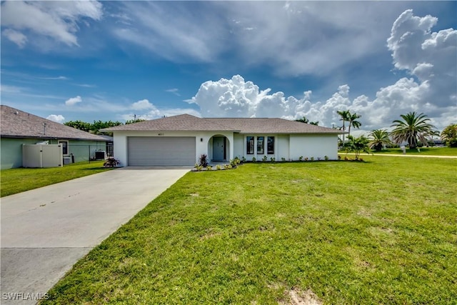 ranch-style house with a garage and a front lawn