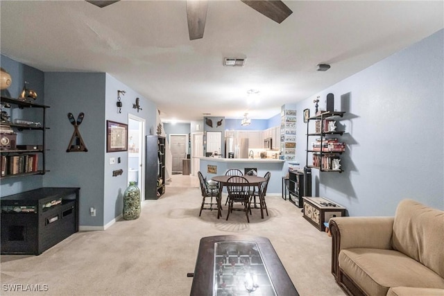 dining room featuring carpet