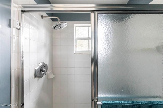 bathroom with an enclosed shower