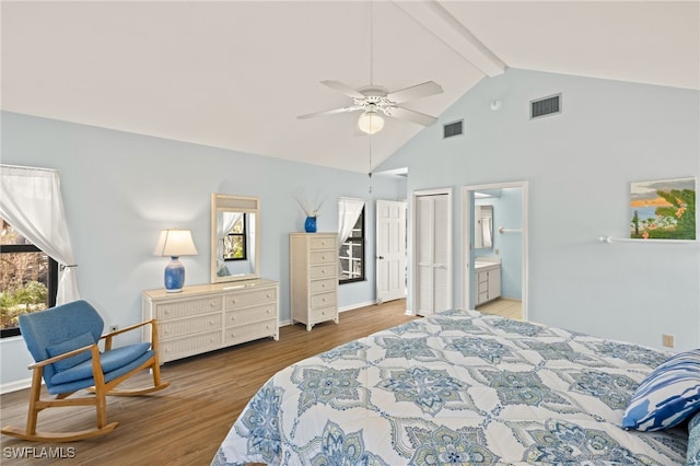 bedroom with high vaulted ceiling, ensuite bath, beam ceiling, ceiling fan, and light wood-type flooring