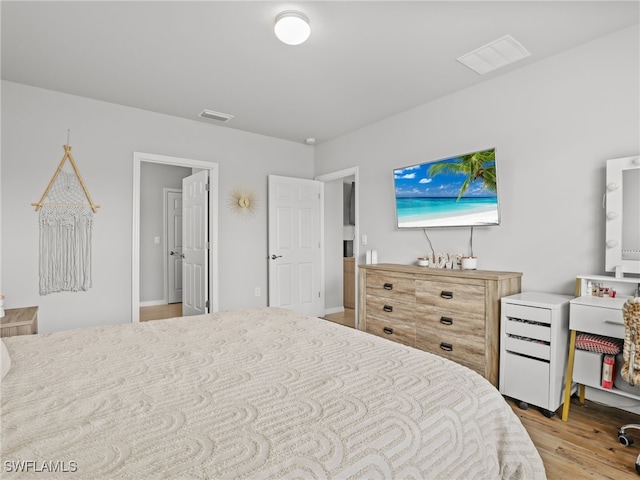 bedroom featuring light wood-type flooring