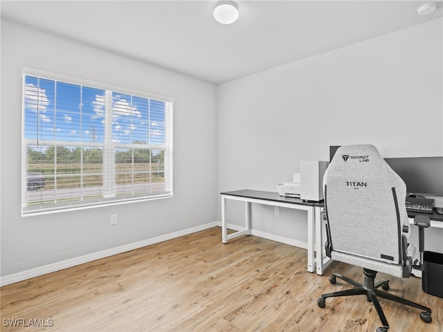 home office featuring light wood-type flooring