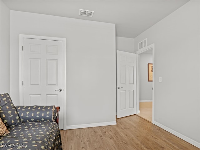 unfurnished room featuring wood-type flooring