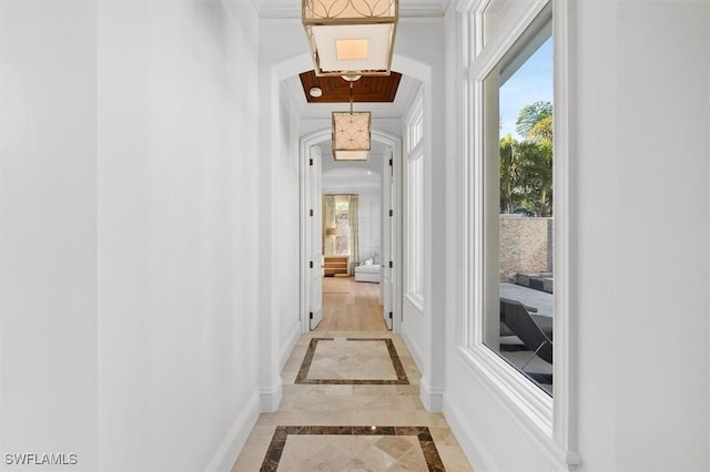 hallway with ornamental molding