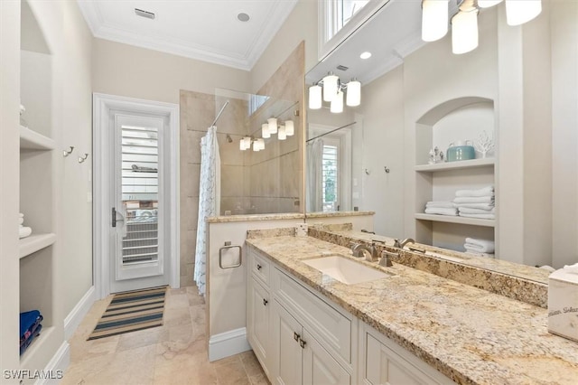 bathroom featuring ornamental molding, curtained shower, built in features, and vanity