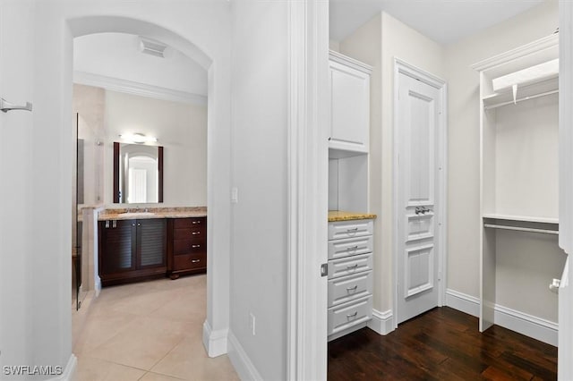 walk in closet featuring hardwood / wood-style floors