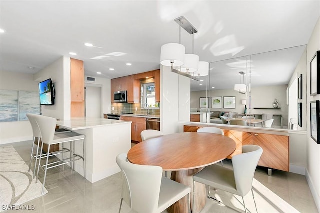 dining area with sink