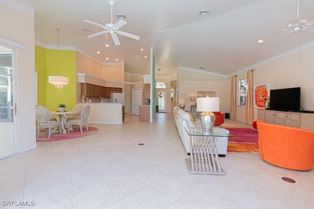 living room featuring a healthy amount of sunlight, ceiling fan, ornamental molding, and high vaulted ceiling