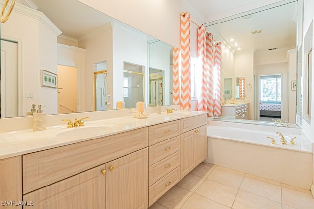 bathroom featuring tile patterned flooring, crown molding, shower with separate bathtub, and vanity