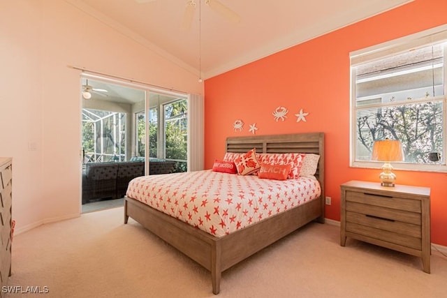 carpeted bedroom featuring vaulted ceiling, ceiling fan, access to exterior, and crown molding