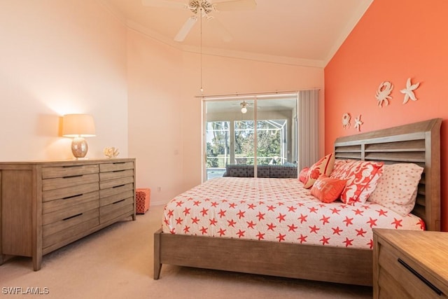 carpeted bedroom featuring access to outside, ceiling fan, and vaulted ceiling