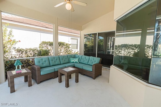 sunroom / solarium featuring vaulted ceiling and ceiling fan