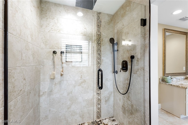 bathroom with a shower with shower door